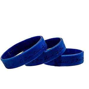 Strength: MEDIUM  6 ¾" Silicone Bracelet in the color Blue. Fits best on youth or those with smaller wrists.   Embossed with 'HARNESS MY SUPERPOWERS' on one side & 'I AM LOVE. I AM FREE' on the other side.